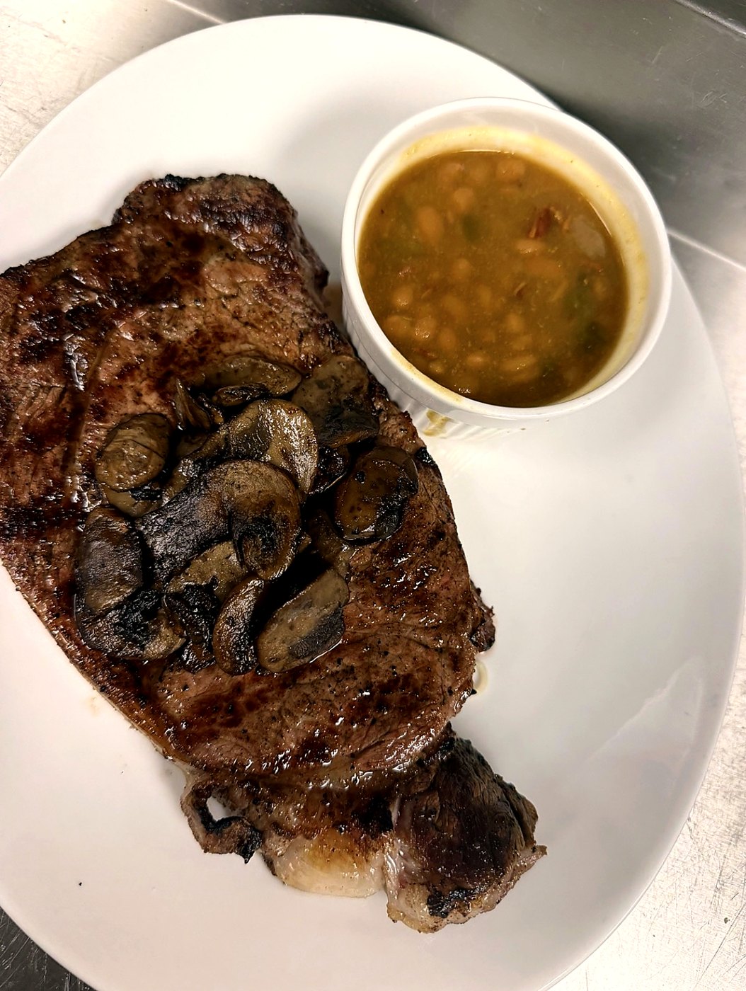 Grilled steak with mushrooms